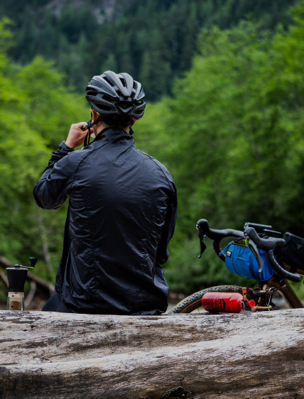 Man on top of biking trail for a break